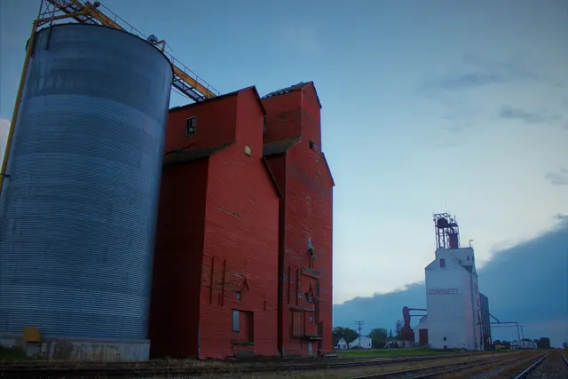 The grain elevators beside the tracks